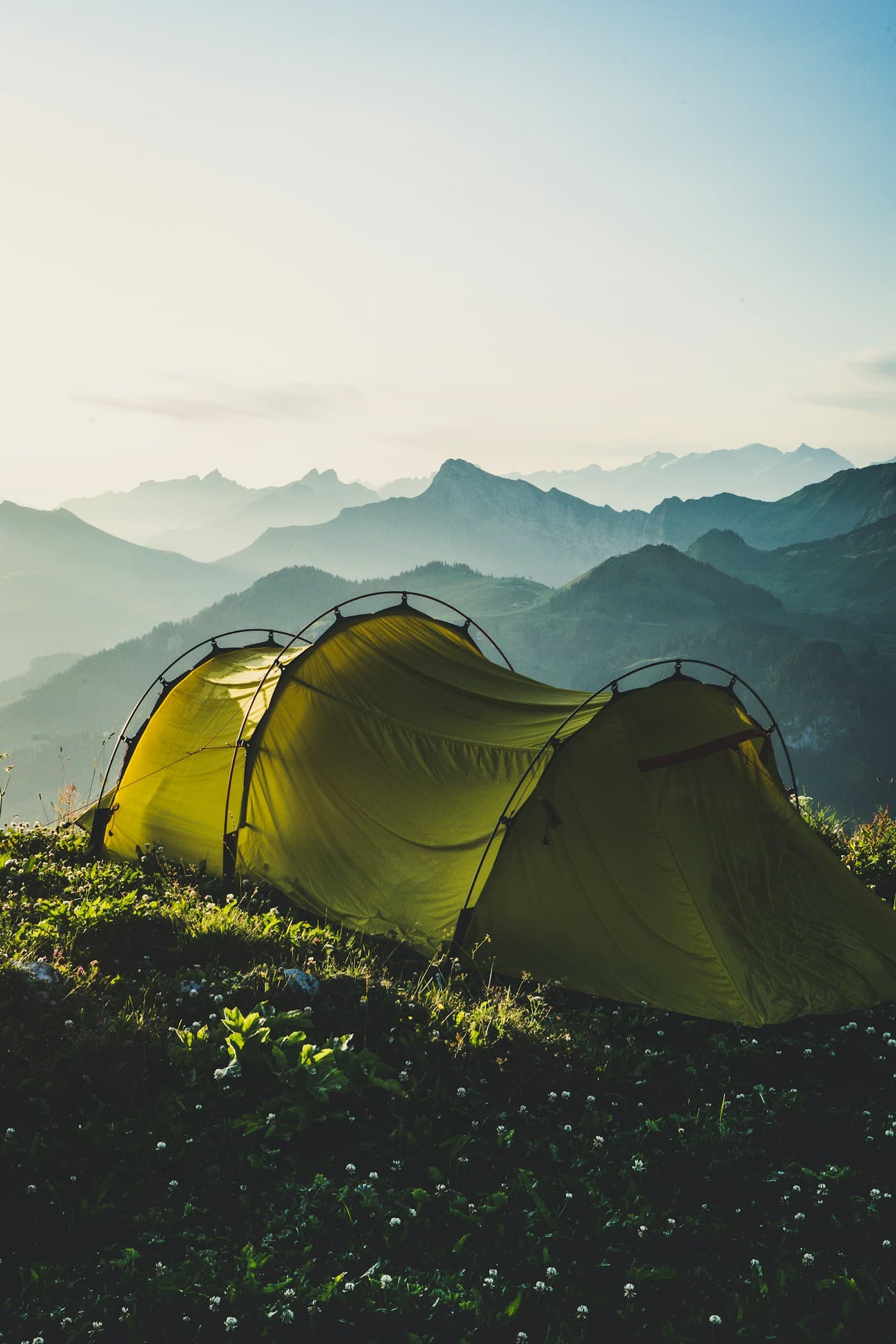 A quiet campsite among mountains, ready for the next day outdoors